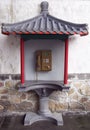 Public telephone box in chinese style. Royalty Free Stock Photo
