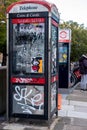Public Telephone Call Box Vandalised With Street Art Graffiti