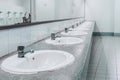 Public toilet and Bathroom interior with wash basin and toilet r Royalty Free Stock Photo