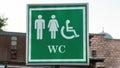 Public toilet sign of restroom with wc sign for men women accessible disabled person in city Royalty Free Stock Photo