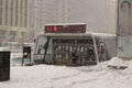 Public transportation stop under snowfall in the snowy streets of Shenyang, China