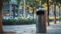 Public trash can with a large opening and a builtin rain cover to prevent odors.