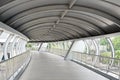 Public walkway overpass The roof has sun and rain. People use it. Travel to safety To walk across the street The corridor can be c