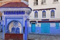 A public water fountain at Place El Haouta in Chefchaouen, Morocco Royalty Free Stock Photo