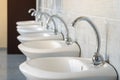 Public water taps in the school`s toilet Royalty Free Stock Photo