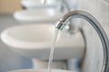 Public water taps in the school`s toilet Royalty Free Stock Photo