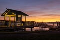 Public waterfront dock at Sunset Royalty Free Stock Photo