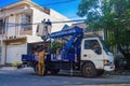 The Public Works Department is organizing messy telecommunications and electrical cables using a sky lift car