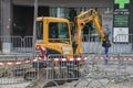 Public works performed in Diepenbeek with an small excavator,. 16-03-2023, Diepenbeek, Belgium.