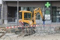 Public works performed in Diepenbeek with an small excavator. 16-03-2023, Diepenbeek, Belgium.