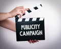 Publicity Campaign. Female hands holding movie clapper Royalty Free Stock Photo