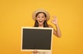 Publicity and education. Happy child give ok sign. Little kid hold blank blackboard. School publicity. Advertising and