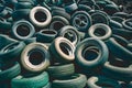 Publish Pile of used rubber tyres, tire dump, environmental concept Royalty Free Stock Photo