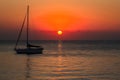 Publish Sun dips below horizon in serene Mediterranean scene