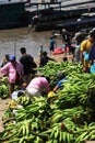 pucallpa peru, ucayali river with boats transporting banana fruits and workers unloading from the jungle to the port