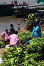 pucallpa peru, ucayali river with boats transporting banana fruits and workers