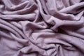 Puce fabric with folds from above