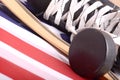 Puck, skates and hockey stick of the American flag Royalty Free Stock Photo