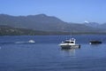 pucon chile with the majestic lake with boats with tourists