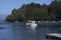 pucon chile with the majestic lake with boats with tourists