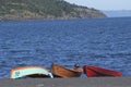 Pucon city with the peculiar black volcanic sand with Villarica lake and artisanal fishing boats in Chile-