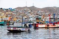 Pucusana, Peru -: views of peruvian fishermen boats and houses in Pucusana village in a cloudy morning in tourist Royalty Free Stock Photo