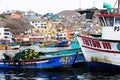 Pucusana, Peru -views of peruvian fishermen boats and houses in Pucusana village in a cloudy morning in tourist Royalty Free Stock Photo