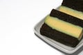 Pudding-covered sponge cake or chocolate-covered sponge cake. Selective focus. Royalty Free Stock Photo