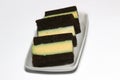 Pudding-covered sponge cake or chocolate-covered sponge cake. Selective focus. Royalty Free Stock Photo