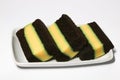 Pudding-covered sponge cake or chocolate-covered sponge cake. Selective focus. Royalty Free Stock Photo