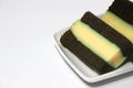 Pudding-covered sponge cake or chocolate-covered sponge cake. Selective focus. Royalty Free Stock Photo