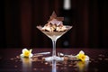 pudding in a martini glass, chocolate shavings on top