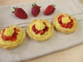 Pudding tartlets with strawberries Royalty Free Stock Photo