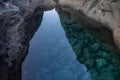 Puddle with crystal clear water. This photo was taken in Charco Manso.