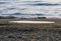 Puddle of water on the beach sand Royalty Free Stock Photo