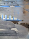 Blue house reflected in puddles topview image Royalty Free Stock Photo