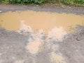 puddles of water on potholed roads to indo Royalty Free Stock Photo