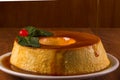 Pudim de leite, a delicious Brazilian flan dessert, with milk and condensed milk, topped with caramel sauce. It`s type of vanill Royalty Free Stock Photo