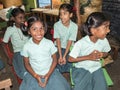 Happy funny children friends girls and boys classmates smiling laughing in classroom at the school Royalty Free Stock Photo