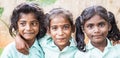 Best children friends girls classmates smiling laughing standing with hand on shoulder at the school. Multiethnic school kids