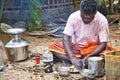 Poor Indian Dalit people having lunch on the floor