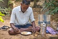 Poor Indian Dalit people having lunch on the floor