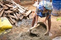 Indian workers covered the top of the log cabin with coconut leaves to serve tourists