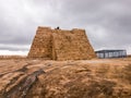 The stone bastion of the ancient Thirumayam Fort on a rocky hill