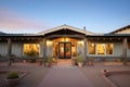 pueblo house faade at dusk with wooden beams Royalty Free Stock Photo