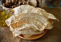 Pueraria mirifica or White Kwao Krua on wooden plate