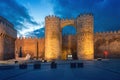 Puerta del Alcazar Gate of Medieval Walls of Avila at night - Avila, Spain Royalty Free Stock Photo