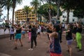 Group Zumba fitness dance class in the public city park Parque Plaza Del Charco