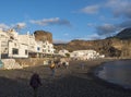 Puerto de las Nieves, Agaete, Gran Canaria, Canary Islands, Spain December 20, 2020: View of the volcanic pebble beach Royalty Free Stock Photo