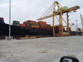 Puerto de Sagunto, Spain 11 /03/2020: Barco de mercancias cargando contenedores Royalty Free Stock Photo